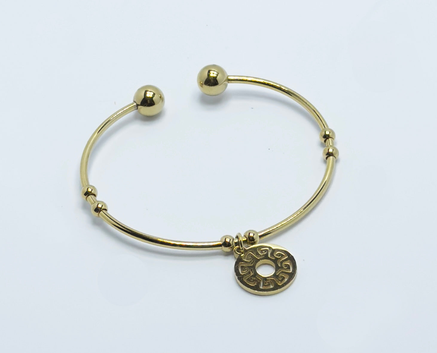 Elegant Open Cuff Bracelet with Engraved Medallion