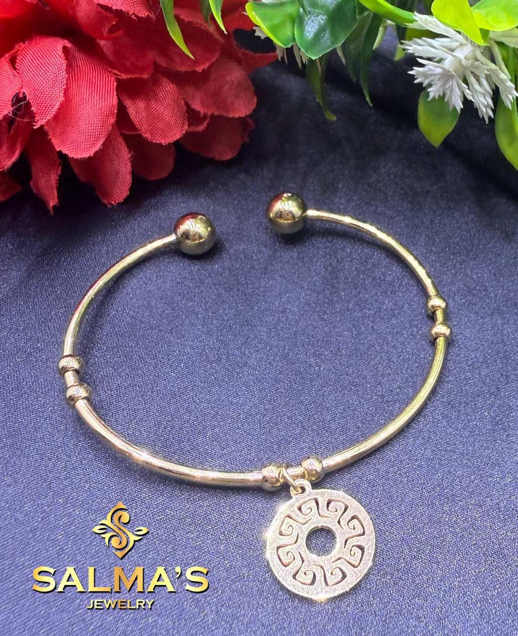 Elegant Open Cuff Bracelet with Engraved Medallion