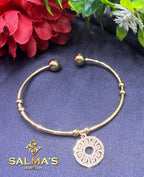 Elegant Open Cuff Bracelet with Engraved Medallion