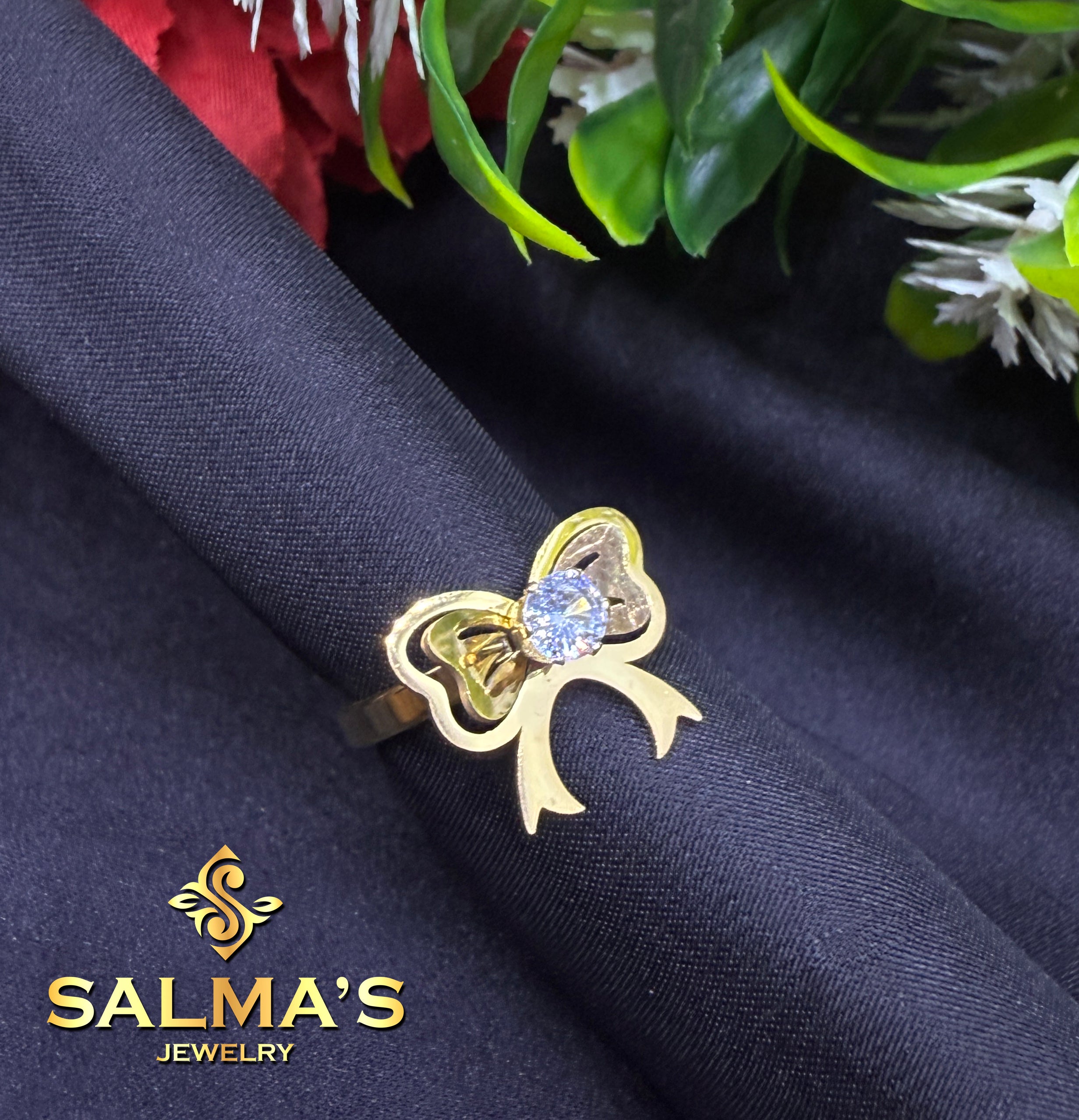 Gold-Toned Bow Ring with Central Crystal Accent