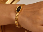 Elegant Gold-Tone Stainless Steel Bangle Watch for Women - Slim Oval Dial 🌟