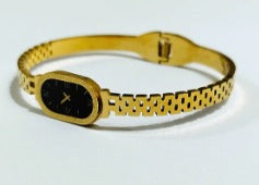 Elegant Gold-Tone Stainless Steel Bangle Watch for Women - Slim Oval Dial 🌟