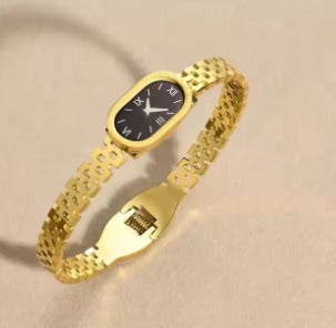 Elegant Gold-Tone Stainless Steel Bangle Watch for Women - Slim Oval Dial 🌟